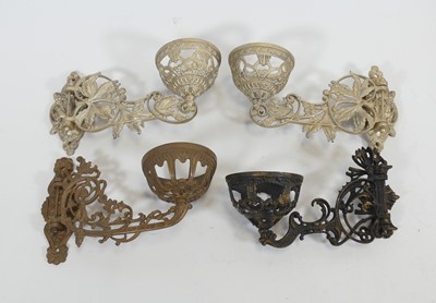 Lot 60 - A set of four painted metal wall sconces, each...