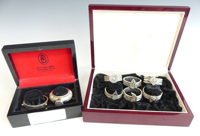 Lot 2197 - A cased set of six Omani silver napkin rings...