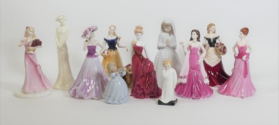 Lot 89 - A collection of 11 porcelain figures, to...