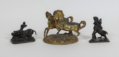 Lot 96 - A gilt metal group of prancing horses, height...