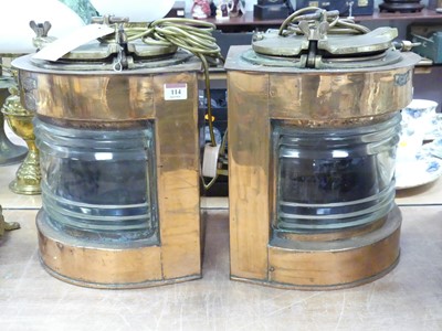 Lot 114 - A pair of early 20th century copper and brass...