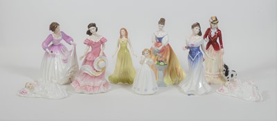 Lot 115 - A collection of nine Royal Doulton figures of...