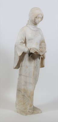 Lot 116 - A carved alabaster figure of a woman, shown...