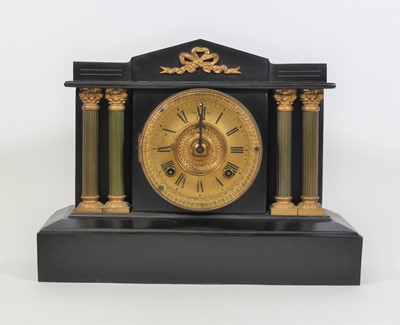 Lot 118 - A Victorian black painted metal mantel clock...