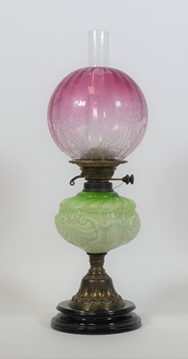 Lot 122 - A Victorian brass oil lamp, having a green...