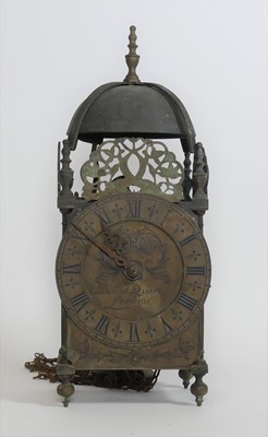 Lot 133 - An antique brass lantern clock, having an...