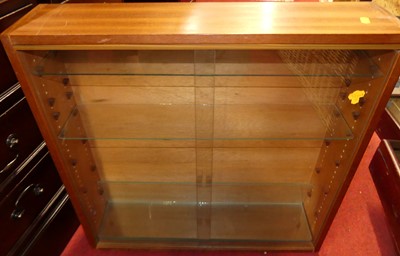 Lot 1073 - Teak glazed hanging wall cabinet for collector'...