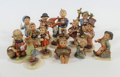 Lot 169 - A collection of Goebels figures of children,...