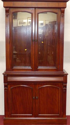 Lot 1124 - A contemporary hardwood bookcase cupboard,...