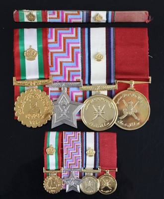 Lot 404 - A group of four Omani medals to include...