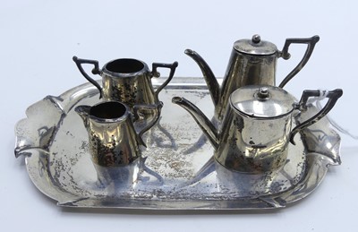 Lot 260 - An Edwardian silver miniature tea set...