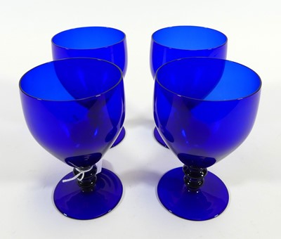 Lot 190 - A set of four Bristol Blue glass rummers, each...