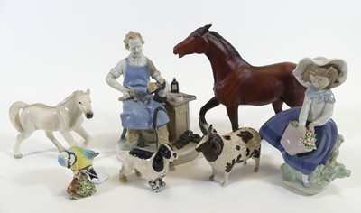 Lot 193 - A collection of porcelain pottery animals and...