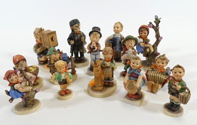 Lot 192 - A collection of Goebels figures of children,...