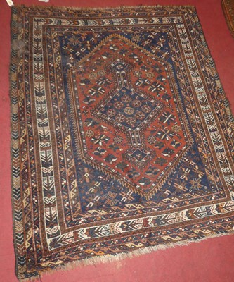 Lot 1147 - A Persian woollen blue and red ground Heriz...