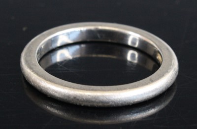 Lot 297 - A platinum wedding band, 5.4g, size K