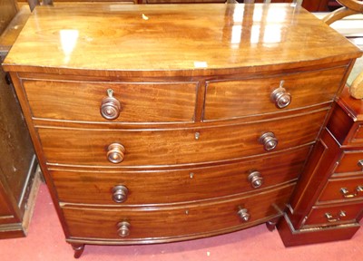 Lot 1176 - A Regency mahogany bowfront chest of two short...