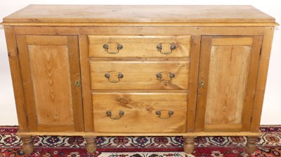 Lot 1186 - A Victorian stained pine sideboard, having...