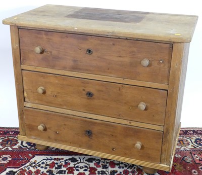 Lot 1192 - A rustic provincial French pine chest of three...