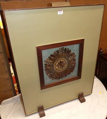 Lot 1196 - A painted hardwood firescreen, inset with...