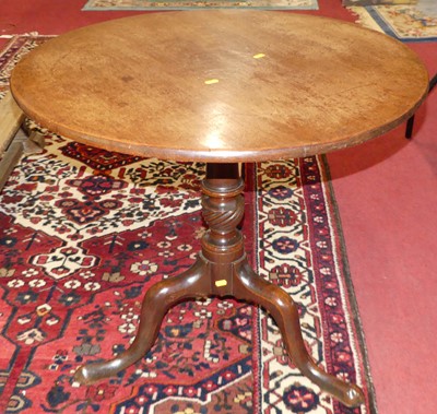 Lot 1209 - A George III mahogany circular tilt-top...