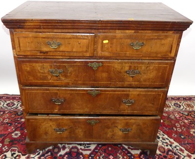 Lot 1210 - An 18th century figured walnut and crossbanded...