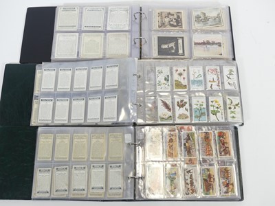 Lot 426 - Five albums of cigarette cards, to include...