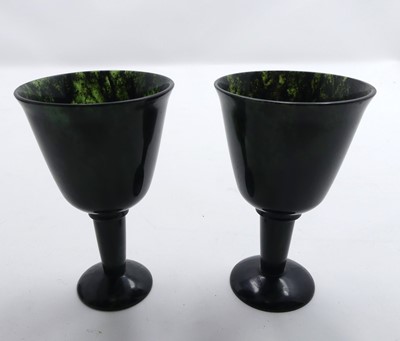 Lot 447 - A pair of 20th century spinach jade goblets, h....