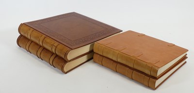 Lot 448 - A pair of Italian tan leather bound photograph...