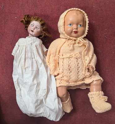 Lot 583 - A continental bisque-headed doll having...