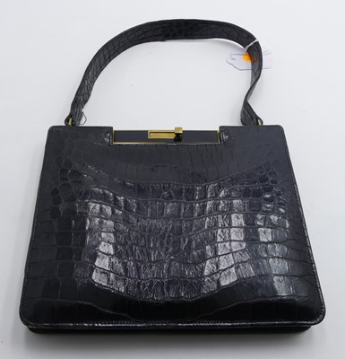 Lot 470 - A lady's embossed black leather handbag,...