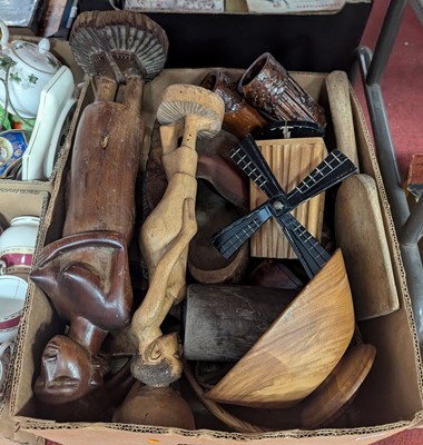 Lot 555 - A collection of various wood carvings, to...