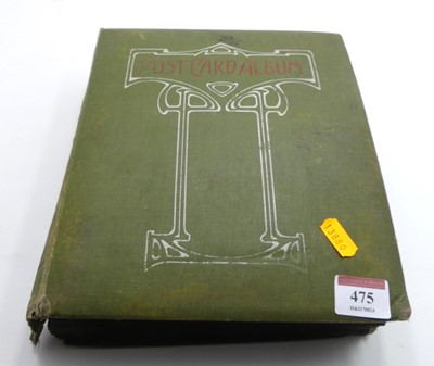 Lot 475 - An early 20th century postcard album,...