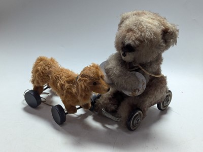 Lot 497 - A vintage child's pull-along Steiff dog,...