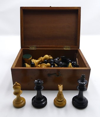 Lot 371 - A turned boxwood and ebony thirty-two piece...