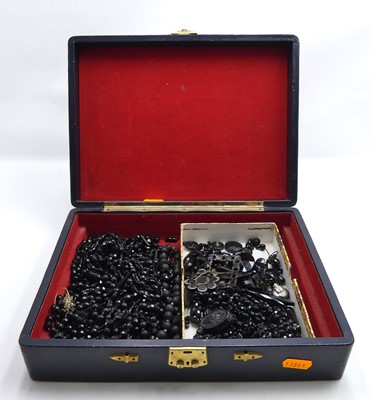 Lot 384 - A collection of Victorian carved jet bead...