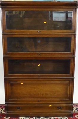 Lot 1228 - A 1920s Globe Wernicke oak four-tier stacking...