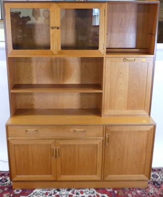 Lot 1232 - A G-Plan teak wall unit, having an arrangement...