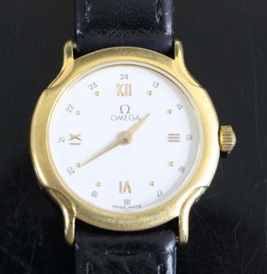 Lot 304 - An Omega lady's 18ct gold cased quartz...