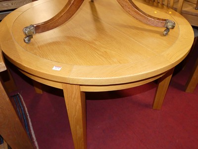 Lot 1274 - A contemporary blond oak extending D-end...