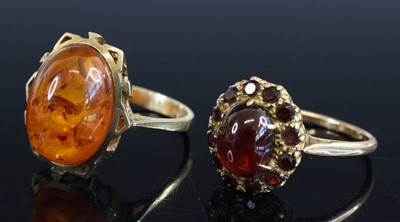 Lot 325 - A continental 9ct gold cabochon orange amber...