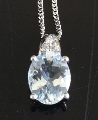 Lot 345 - A modern 9ct white gold, aquamarine and...