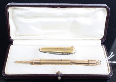 Lot 359 - A cased gilt metal propelling pencil, together...