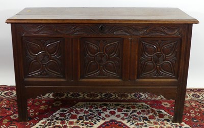 Lot 1317 - A joined oak hinge topped three-panelled...