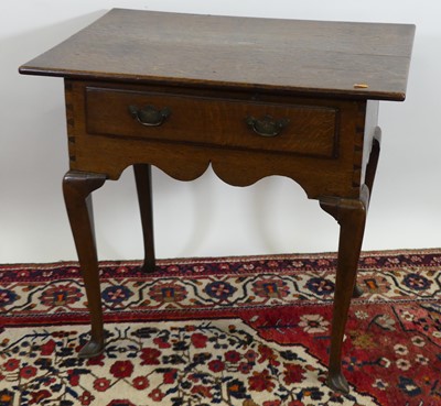 Lot 1322 - An early 19th century provincial single drawer...