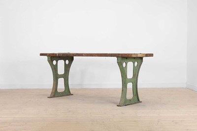 Lot 1333 - An industrial green painted cast iron ended...