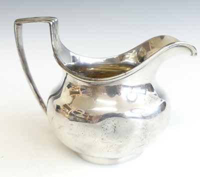 Lot 2119 - A George III silver cream jug, of squat helmet...