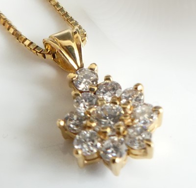 Lot 2308 - An 18ct gold diamond flower shaped cluster...