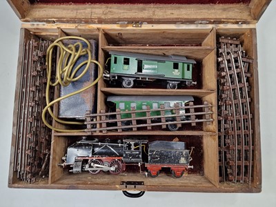 Lot 197 - 0 gauge German 3 rail set, believed to be a...