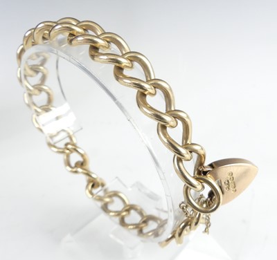 Lot 2315 - A 9ct yellow gold open curblink bracelet, with...